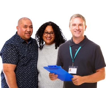 2 family member and a carer holding a clipboard.