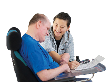 A support worker and a person with disability.