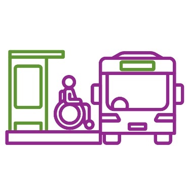 A person in a wheelchair entering a bus from an accessible platform.