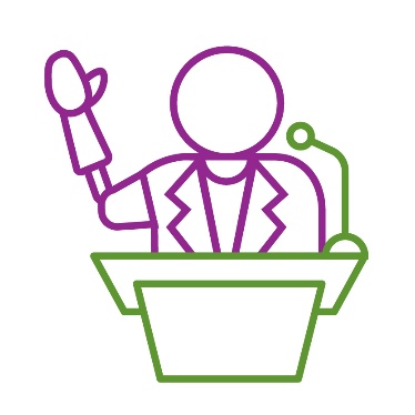 A person with a prosthetic arm speaking at a podium.