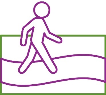 A person walking on a footpath.