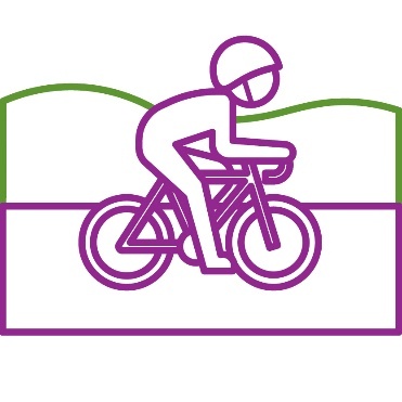 A person riding a bike on a path.