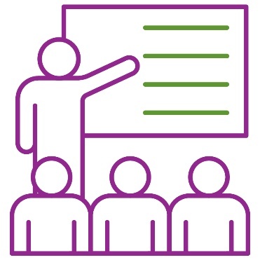 A person pointing to a whiteboard in front of a group of people.