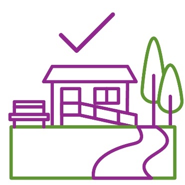 A park with a bench and a path leading to an accessible building. Above is a tick.