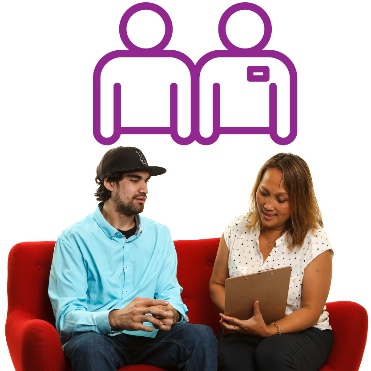 2 people sitting on a couch. One is showing the other information on a clipboard. Above is a support icon.